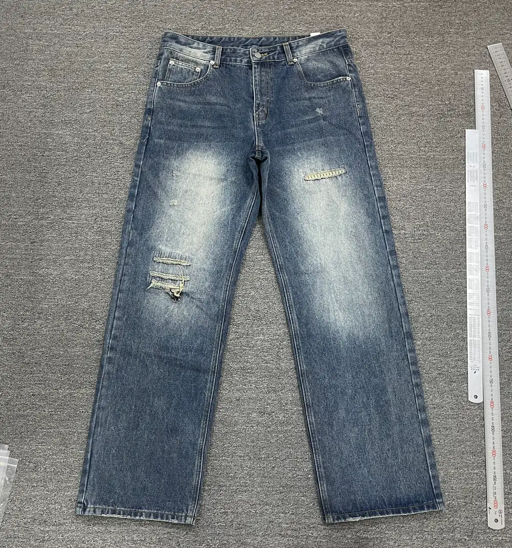Straight-leg washed jeans sample viewed from the front