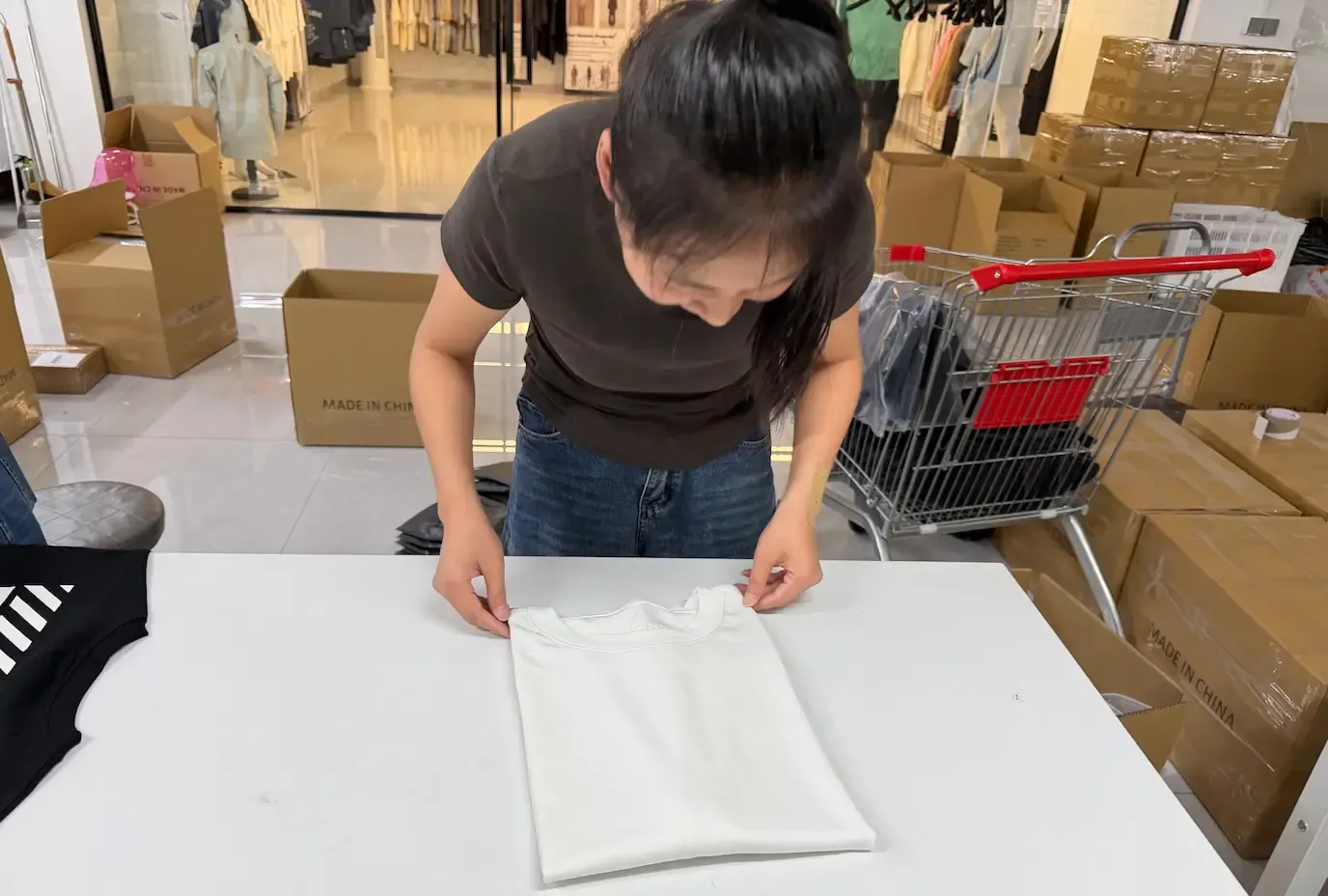 Finished garment being reviewed during final quality inspection