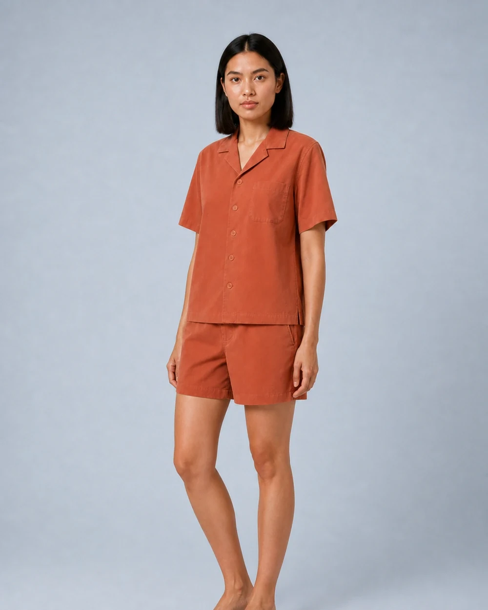 Cove Set shown in a full-length three-quarter model view in Terracotta
