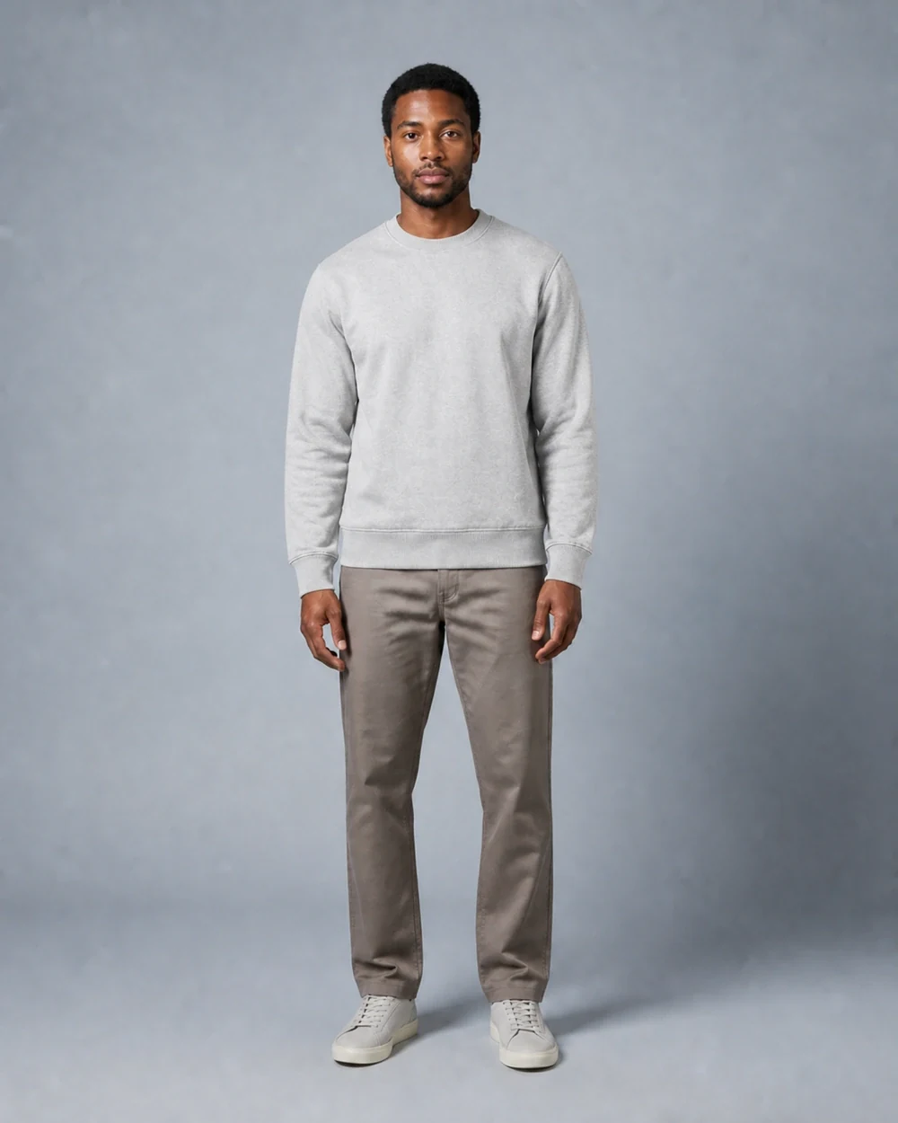 Inspire Crew shown in a full-length front model view in Heather Grey