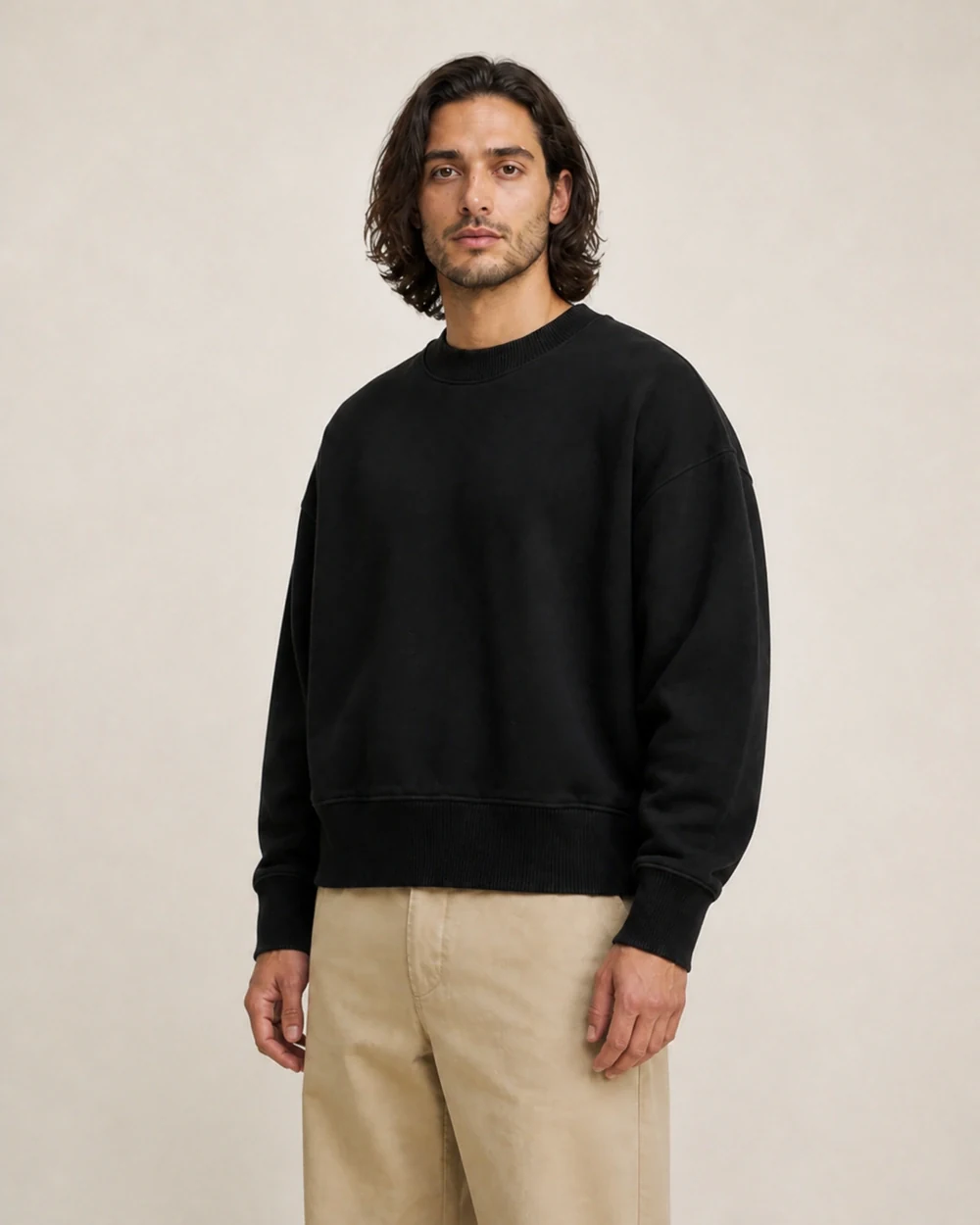 Form shown in a mid-length three-quarter model view in Black