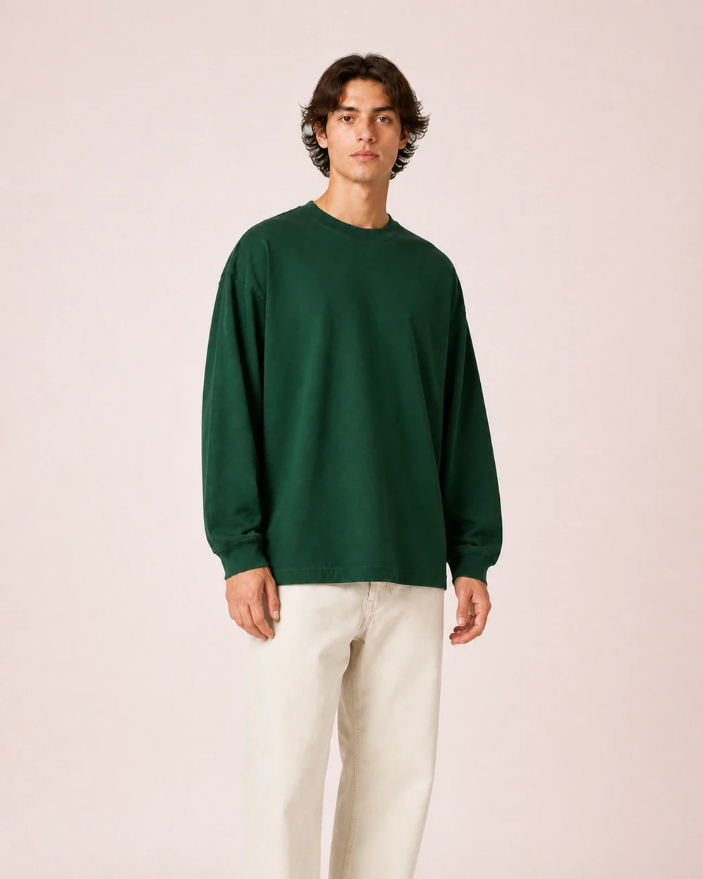 Creator 2.0 Long Sleeve shown in a mid-length three-quarter model view in Forest Green
