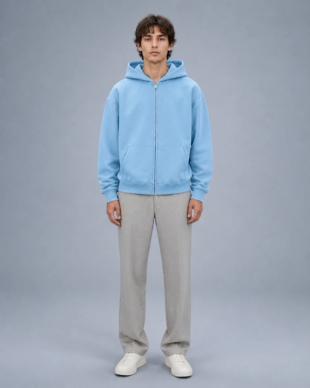 Transit shown in a full-length front model view in Medium Blue