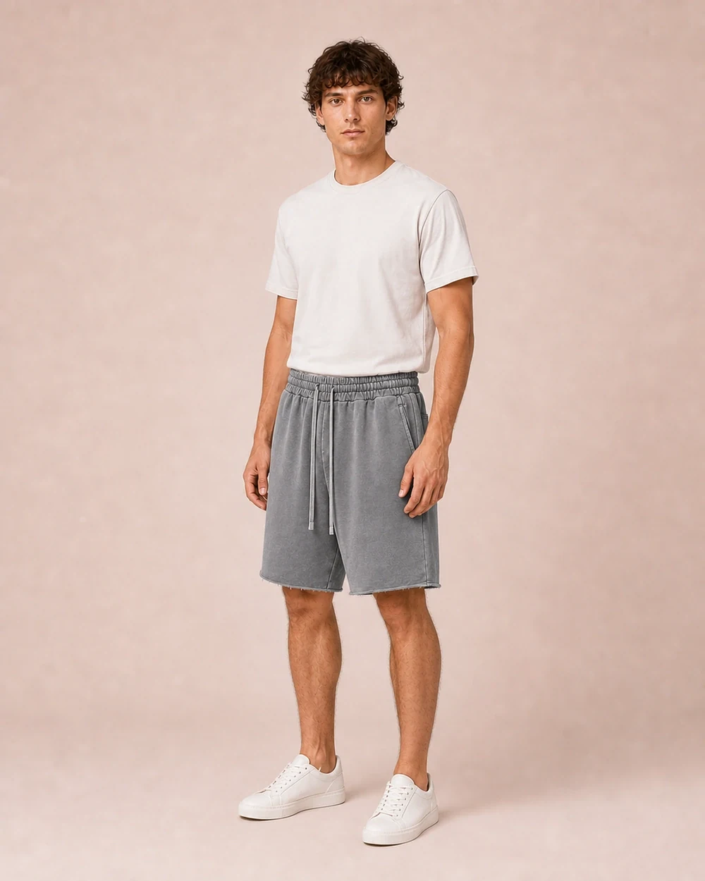 Rawline Shorts shown in a full-length three-quarter model view in Medium Grey