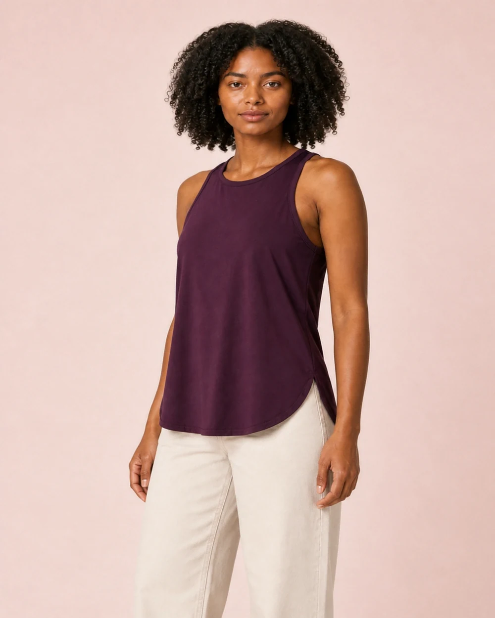 Arc Racerback shown in a mid-length three-quarter model view in Deep Plum
