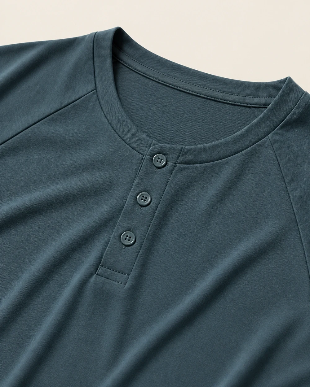 Relay Henley construction detail shown in context in Muted Teal