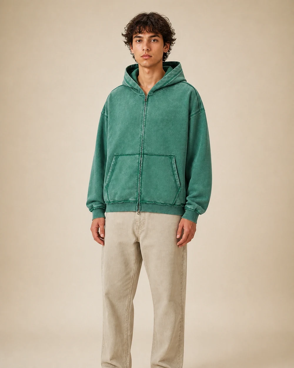 Riven shown in a mid-length three-quarter model view in Vintage Forest Green