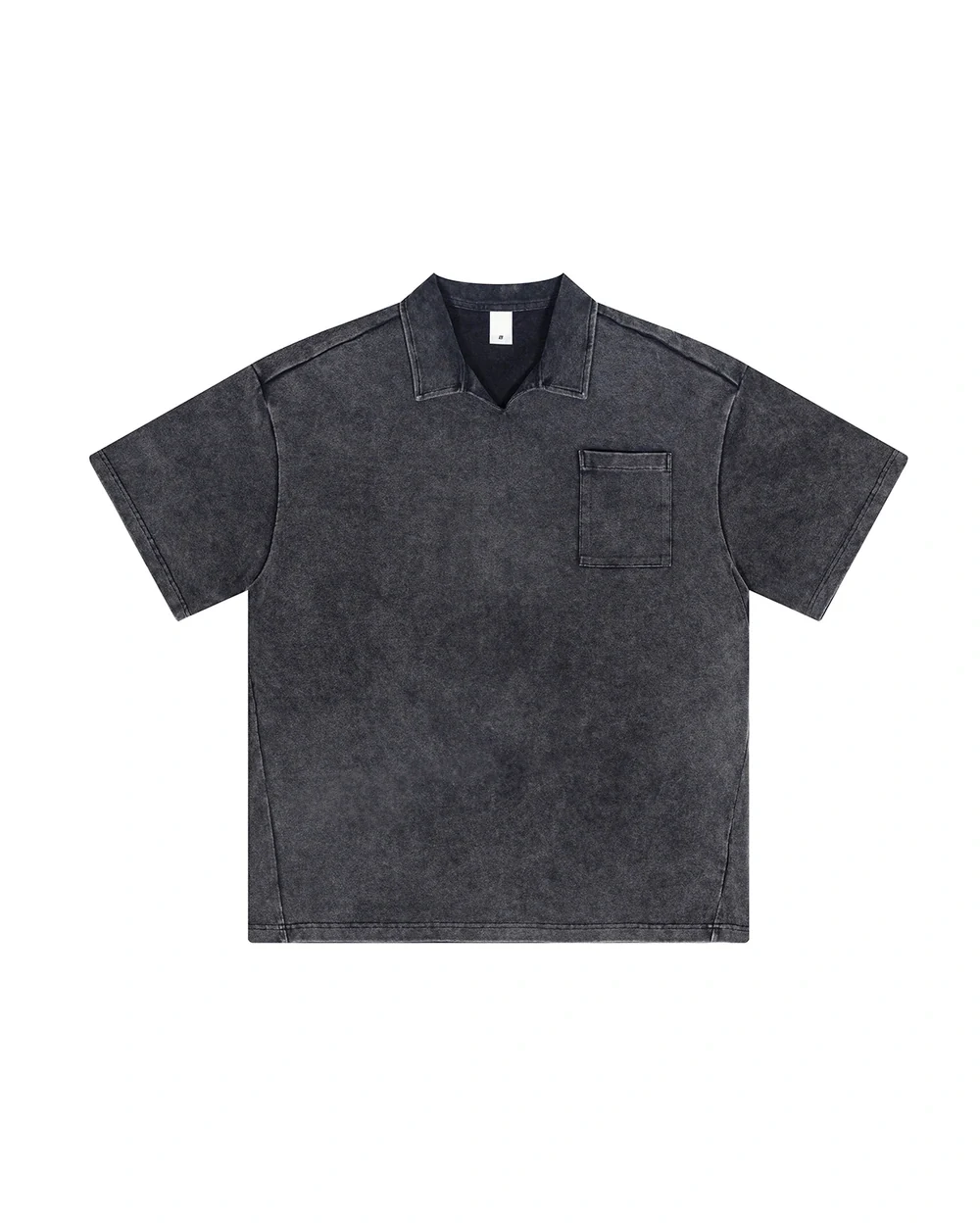 Foundry Polo front garment view in Snow Wash