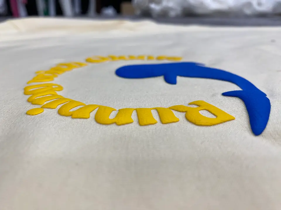 Raised puff print texture on a finished garment