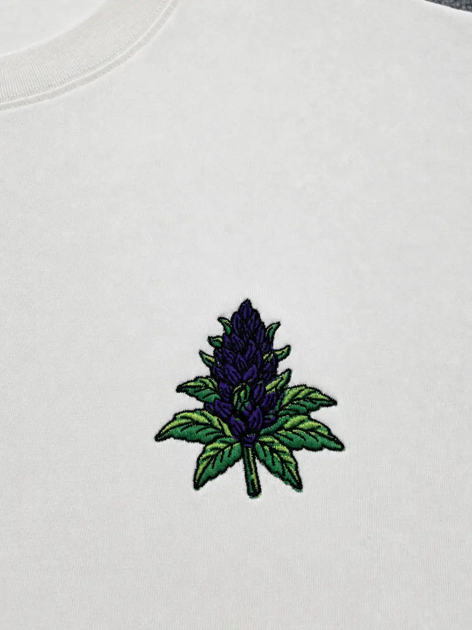 White T-shirt with a finished embroidered logo