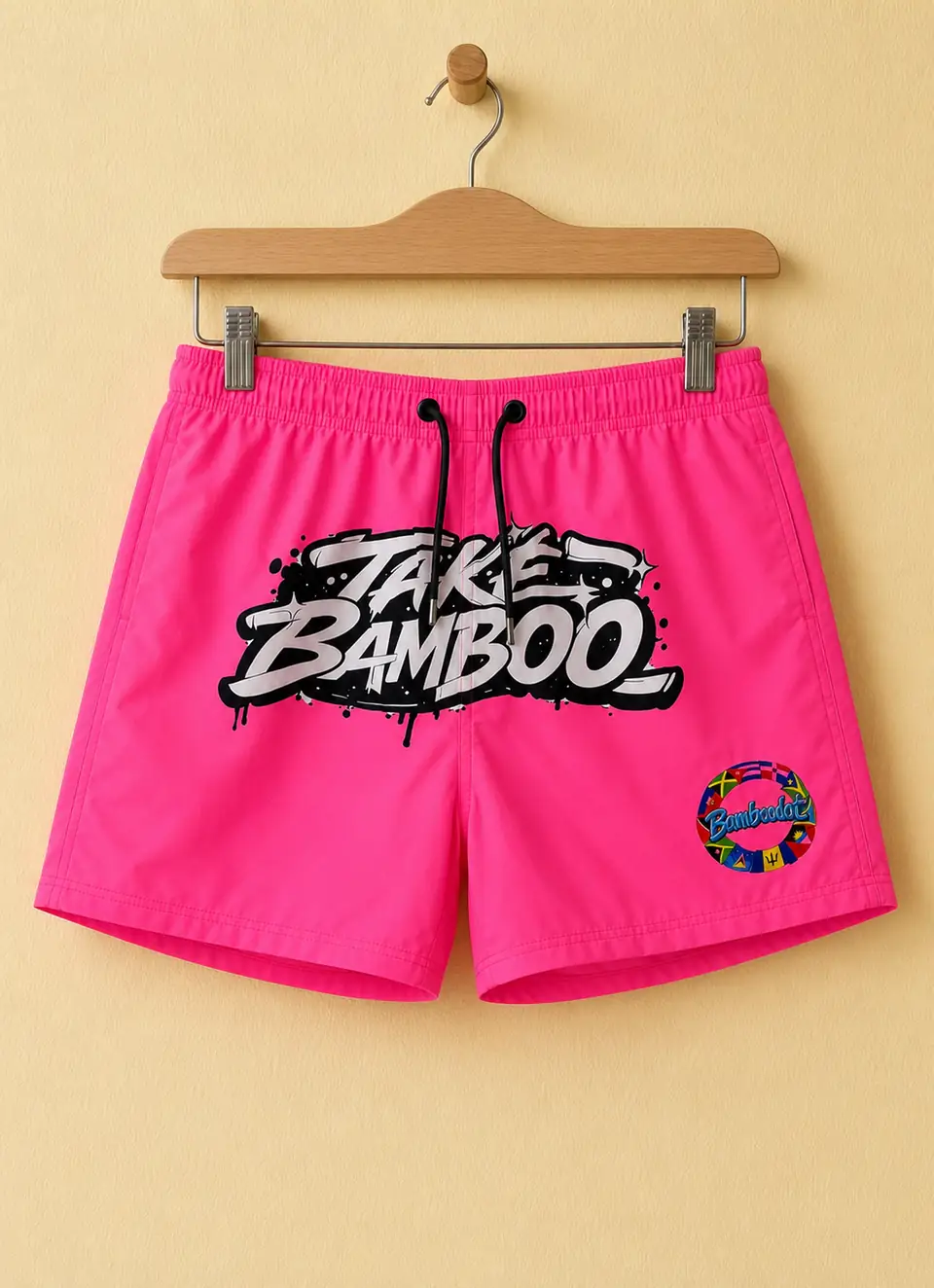 Hot pink shorts with a finished heat transfer graphic