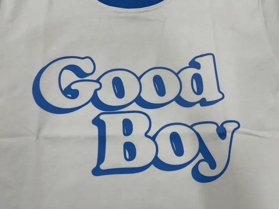 Close view of blue screen printing ink on a white cotton T-shirt